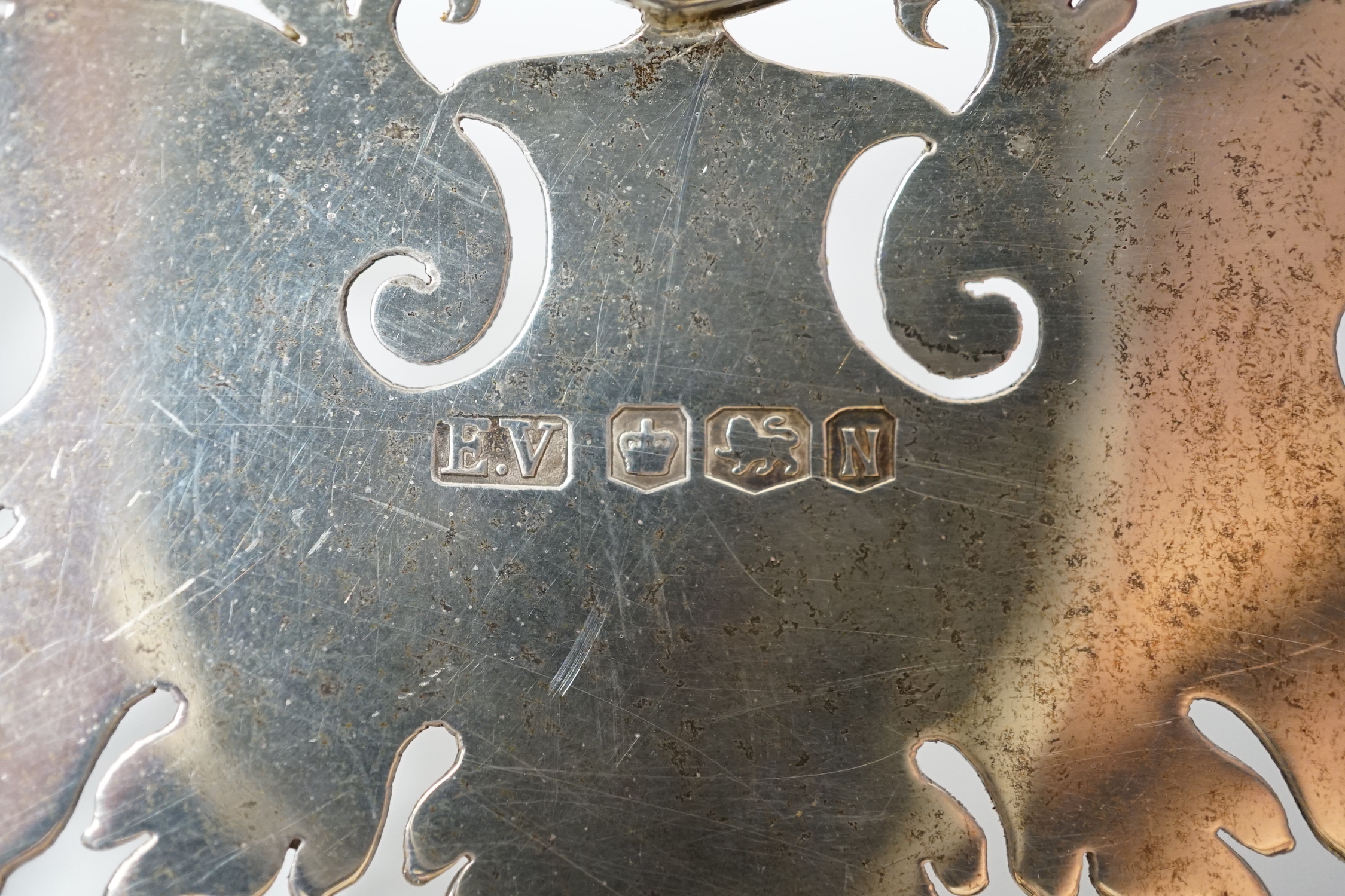 An Elizabeth II pierced silver shallow dish by Viners Ltd, Sheffield, 1955, 29.6cm, 16.9oz.